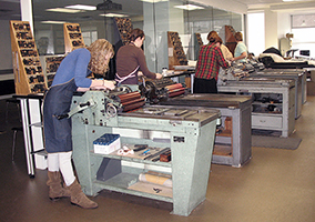 students using letterpress printing presses