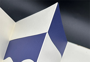 image of blue and white accordion book