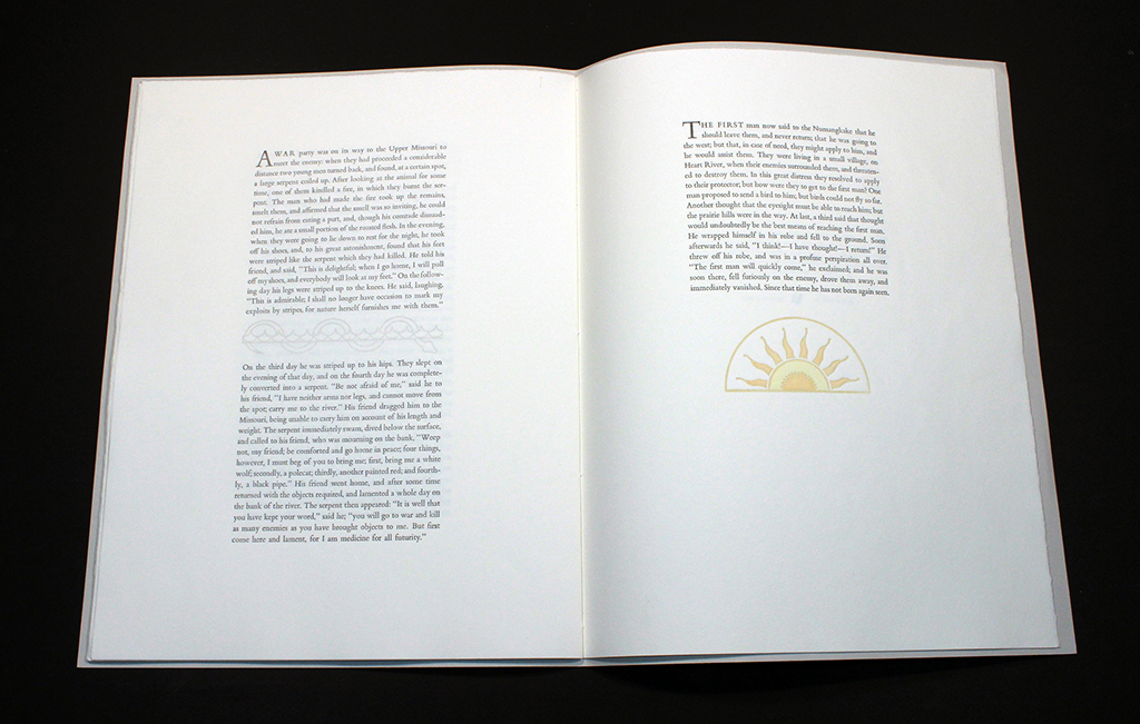 Open book displaying two pages of text from Children of the Sun, with a small sun illustration on the right page.