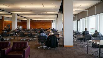 tables and chairs, soft armchairs with lots of natural light