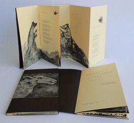 A folded Stranger & Stranger art booklet displaying illustrated wildlife sketches and poetry on cream pages, with a dark cover featuring sheep artwork.