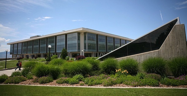 Exterior of Marriott Library with students walking across plaza